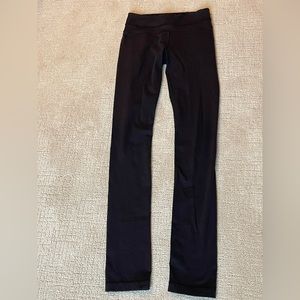 Black Lululemon WunderUnder leggings.Thicker material than newer leggings